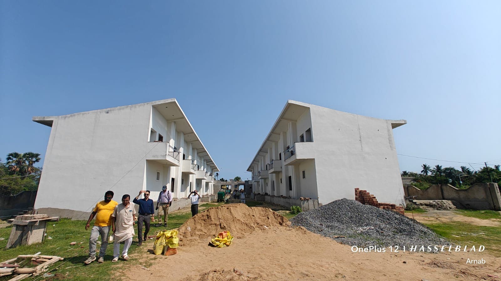 Wide view of the Coastal Queen villa blocks under construction